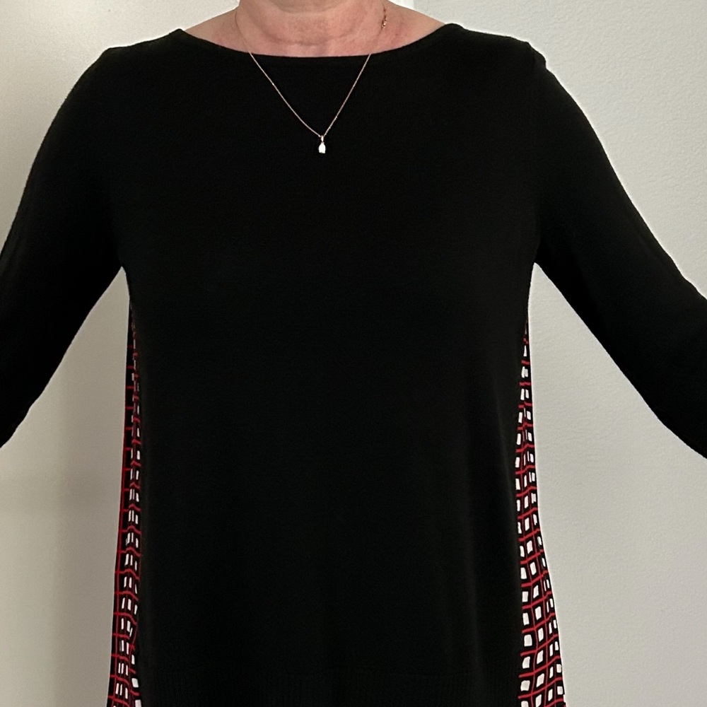 Unique and beautiful sweater blouse combination with pleated back.